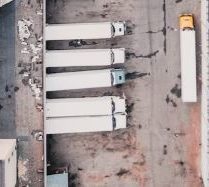 Trucks pulled in to a loading bay to load a shipment